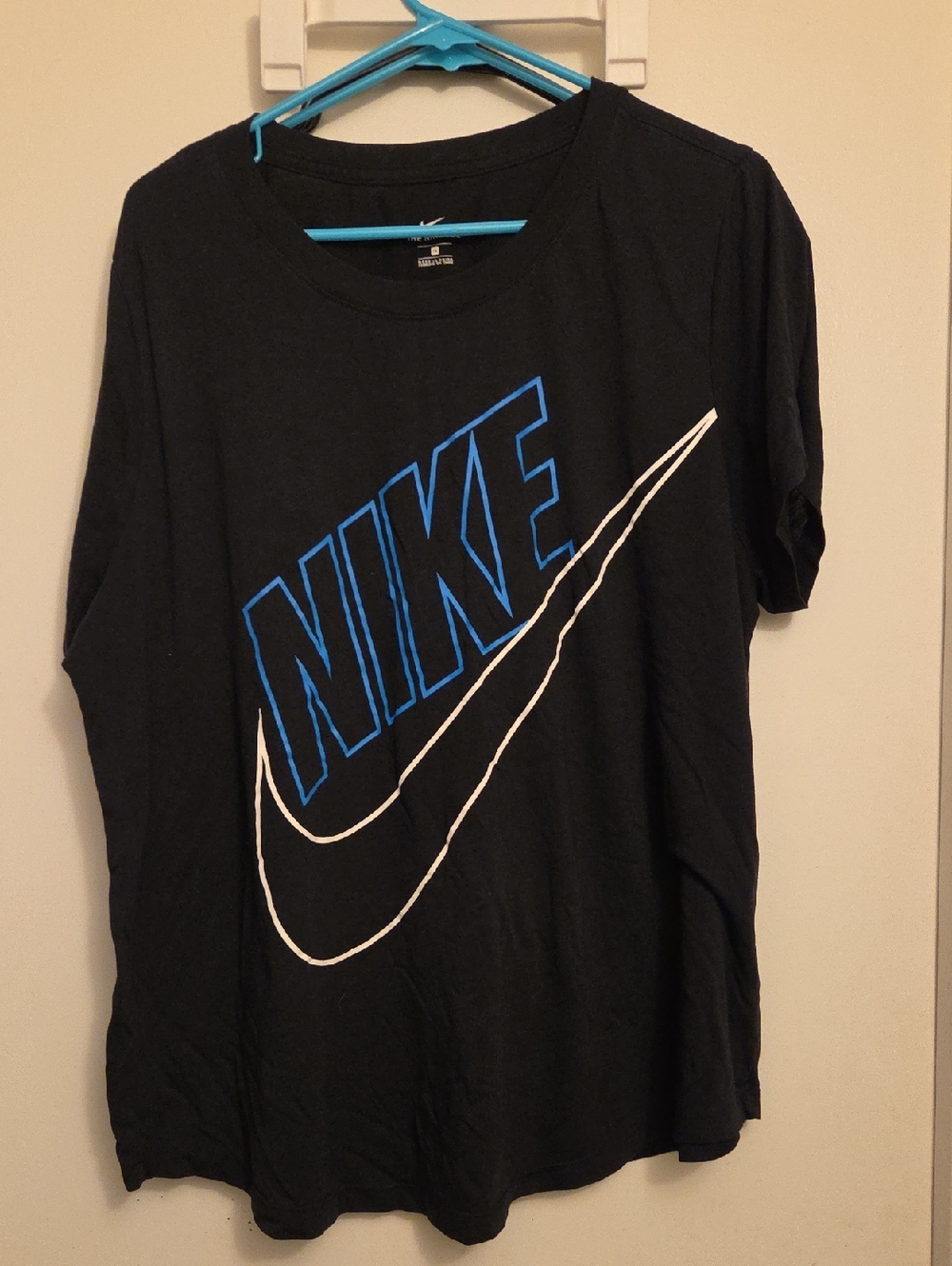 Nike Black Tee with Blue NIKE Text and White Swoosh Outline